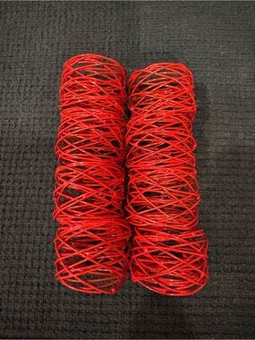 red metal mesh napkin rings used for dining table decoration
